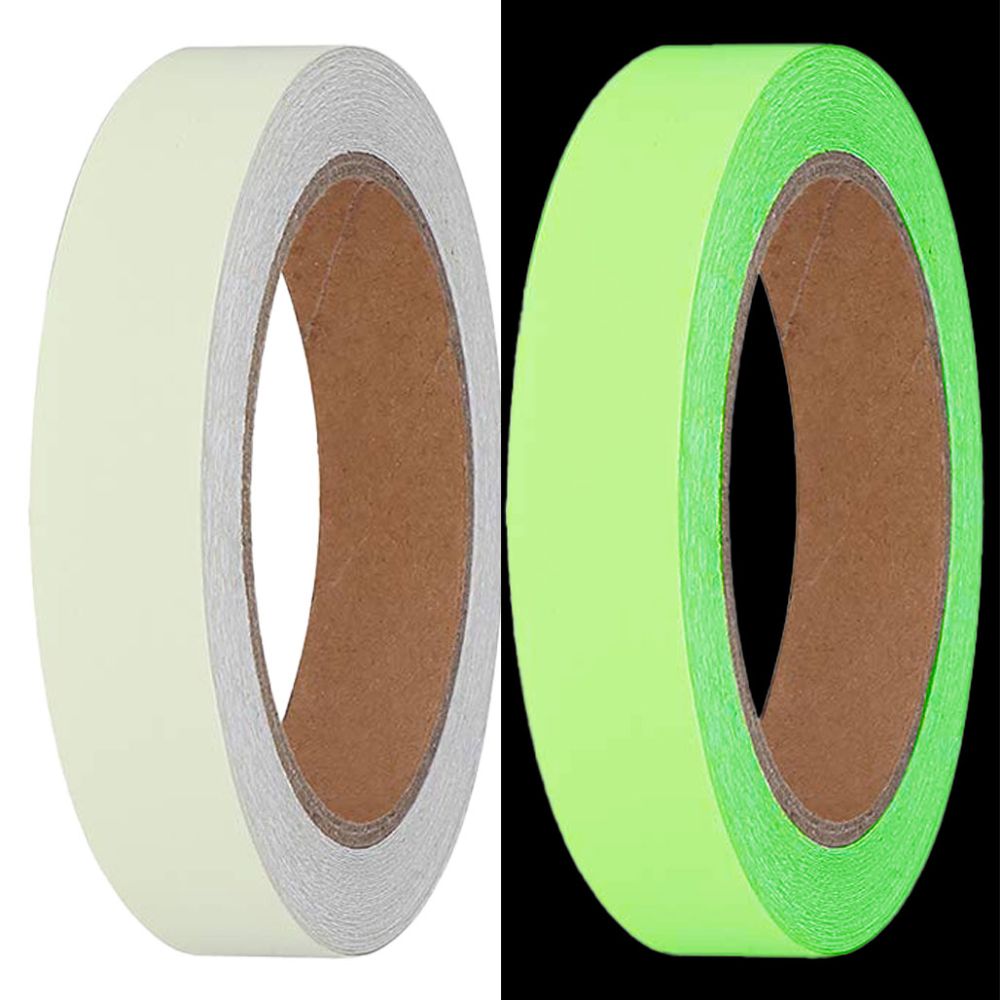 Split screen comparison of a roll of PGD-6 photoluminescent tape, showing its off-white appearance in daylight on the left and its bright green luminous glow in the dark on the right.