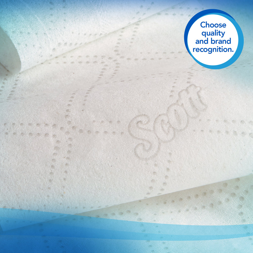 Close-up texture of Scott 07006 Essential Coreless JRT 2-ply toilet paper showing the embossed dotted pattern and brand logo