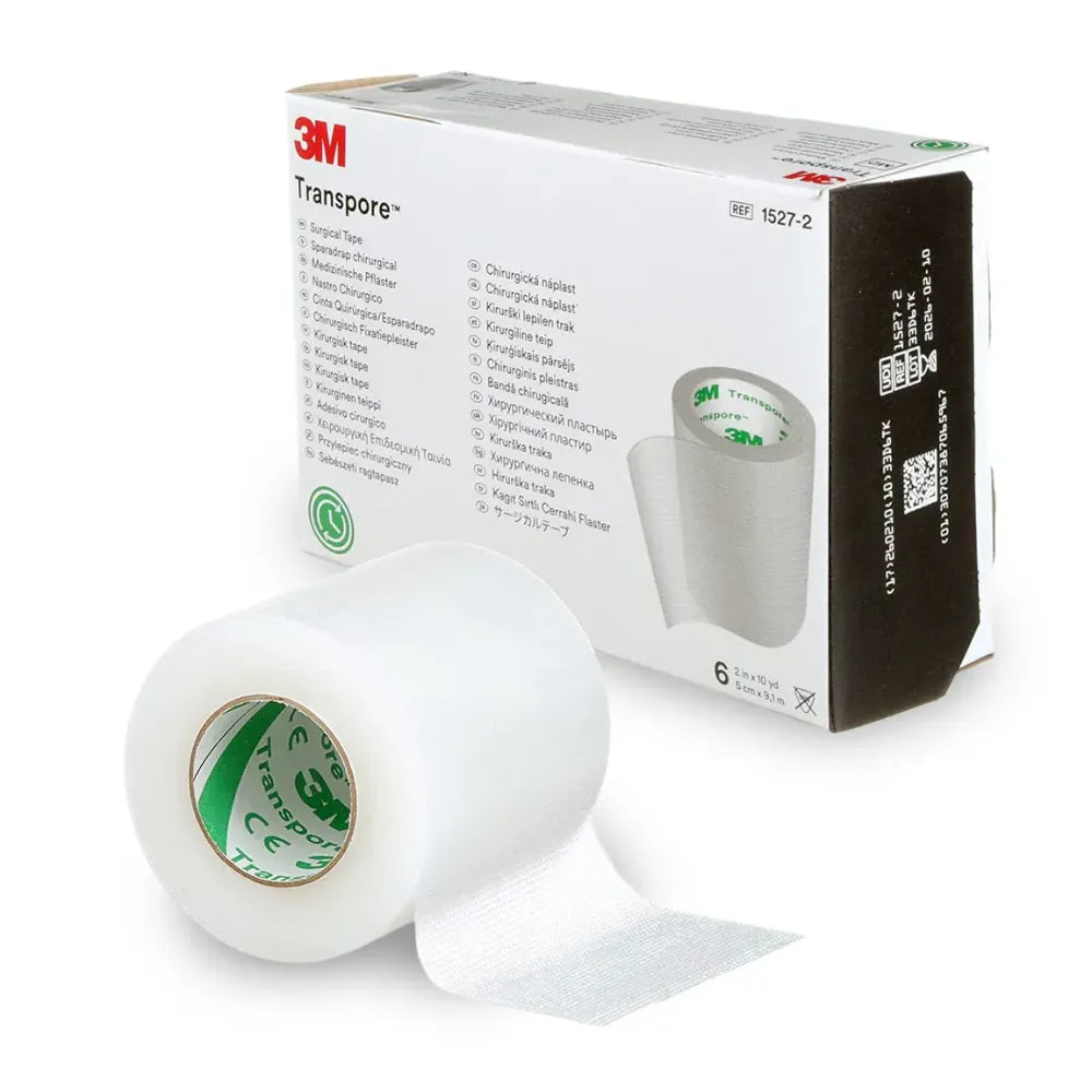Single roll of Transpore Surgical Tape, a clear, perforated plastic medical tape designed for securing dressings and tubing with easy bi-directional tear.