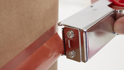 Orange Strapping Tape 4287 Applied on Box with Tape Gun