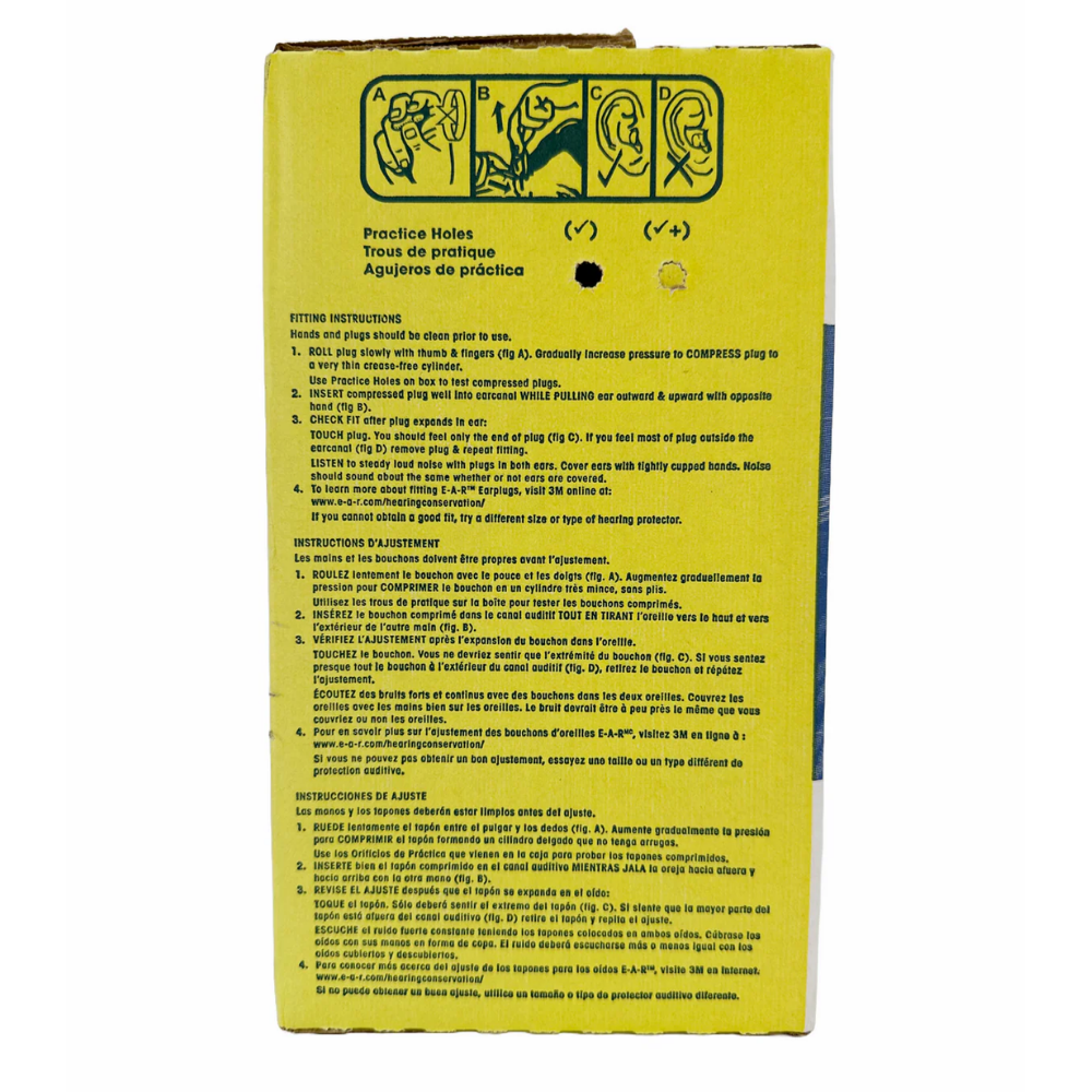 A loose pair of iconic bright yellow cylindrical 3M E-A-R Classic foam earplugs showcasing the textured, moisture-resistant PVC cell walls.