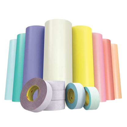 Assorted rolls of 3M medical adhesive tape and film in various colors for medical device manufacturing.