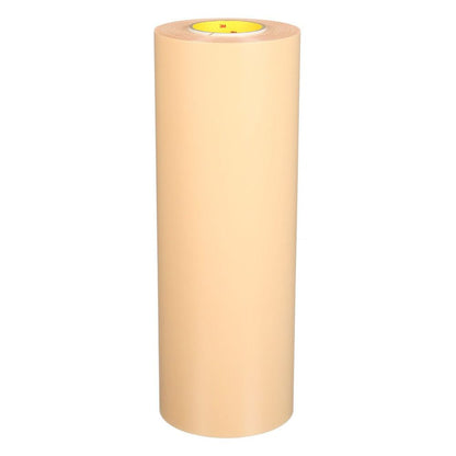 Close-up of a tan 3M medical tape roll showing the adhesive layer and liner peel.