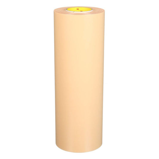 Close-up of a tan 3M medical tape roll showing the adhesive layer and liner peel.