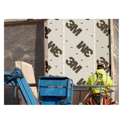 Worker Installing Air & Vapour Barrier Membrane 3015NP on Building Wall