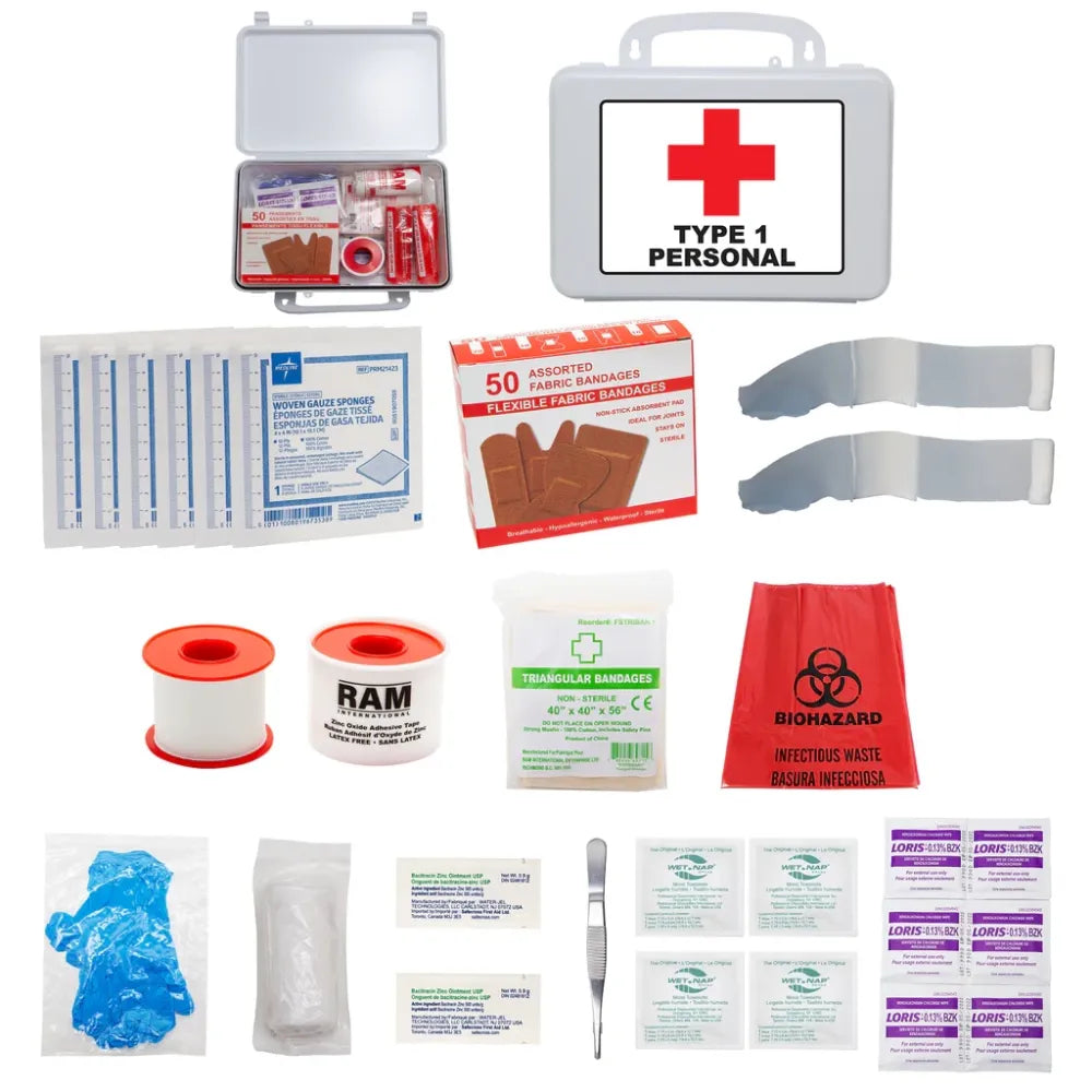Full contents of a CSA Type 1 Personal First Aid Kit including bandages, gauze, antiseptic wipes, and biohazard bag next to a white plastic carrying case.