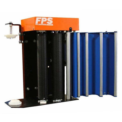 Close-up of a Fox Packaging Services pre-stretch film carriage assembly featuring an orange top cover, textured black rollers, and an open blue safety gate guard