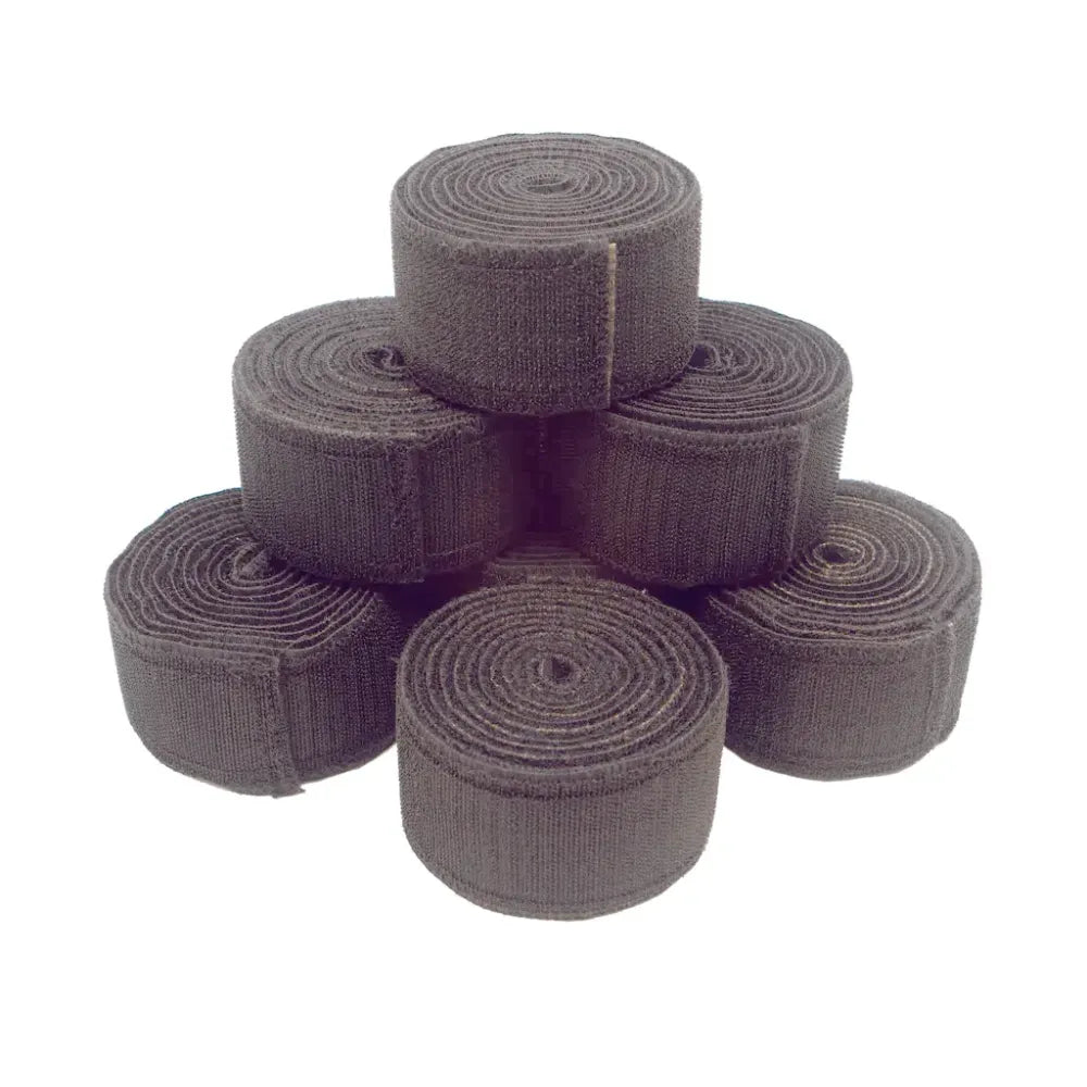 High-strength Heavy FS7PSS Duty Velcro Stretcher Straps shown in a stacked set of black 2-inch wide rolls, designed for medical spine board immobilization.