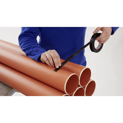 Applying Black Strapping Tape 4288 on PVC Pipes Bundle
