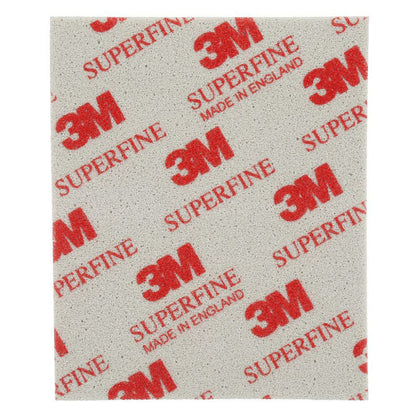 Single 3M 03810 superfine grade softback sanding sponge 115mm x 140mm showing grey foam abrasive face with red 3M Superfine branding made in England for ultra-fine finishing on clearcoat paint and primer