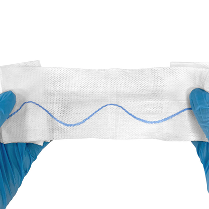 LEO L-12041 Hemostatic Gauze 3x145 close-up with X-ray strip held by gloved hands