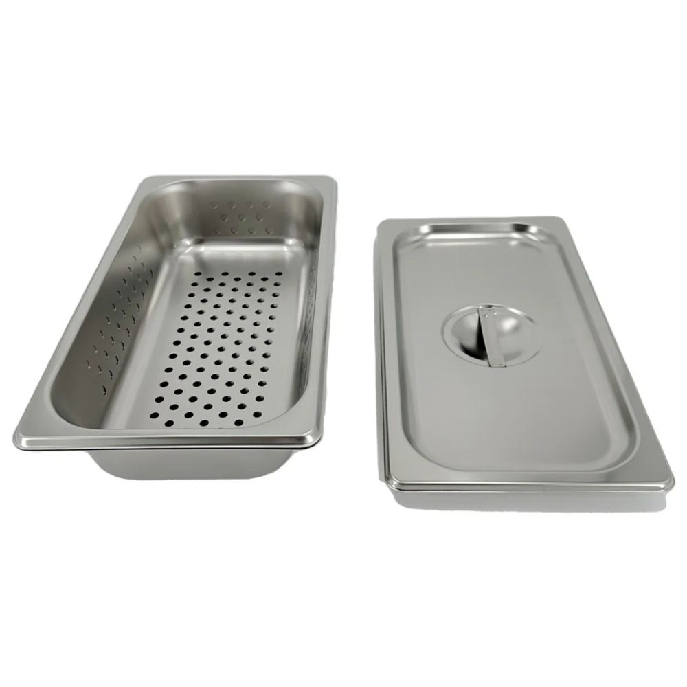 The LEO stainless steel sterilizer tray positioned next to its official retail display box.