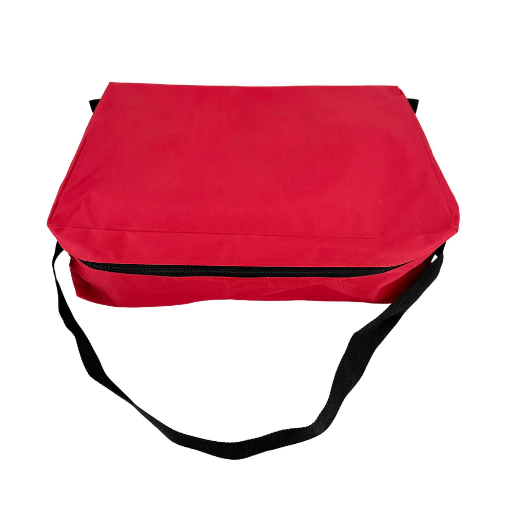 Inside view of the spacious empty main compartment of the red LEO nylon first aid bag with interior liner pockets.