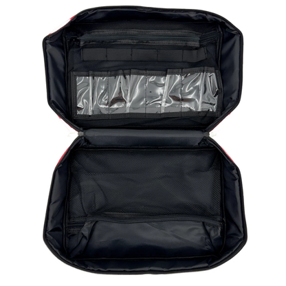 Open view of the red LEO polyester first aid bag showing spacious interior compartments and mesh pocket organizers.