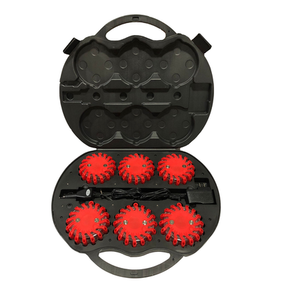 LEO 6-piece red LED safety flare kit inside a black hardshell charging case with AC and DC power adapters for emergency roadside use.