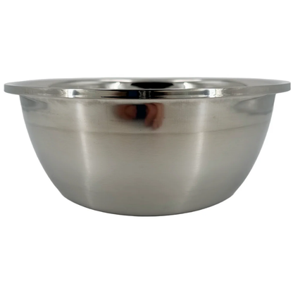 Top down view of a round LEO stainless steel wash basin for medical treatment chairs with a central drain hole.