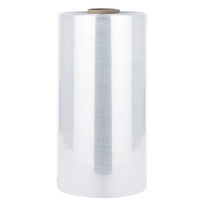 A single wide vertical roll of clear transparent cast machine stretch film wrap featuring two-sided cling property with a brown cardboard inner core isolated on a white background
