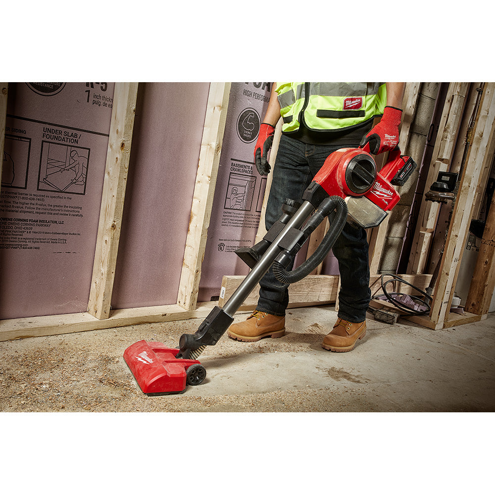 Milwaukee M18 FUEL cordless compact vacuum with powered floor tool cleaning construction site floor