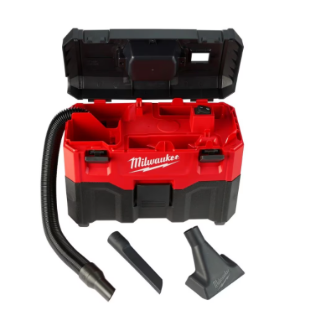 An overhead view of the open Milwaukee 0880-20 cordless wet dry vacuum kit displaying the onboard hose, a crevice tool, and a wide utility nozzle attachment accessory.