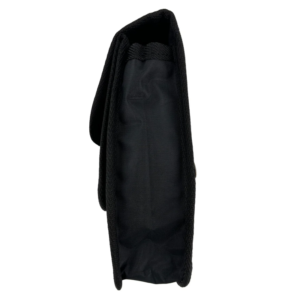 Side view of the LEO multi-compartment utility holster showing deep pockets for shears, pens, and professional instruments.