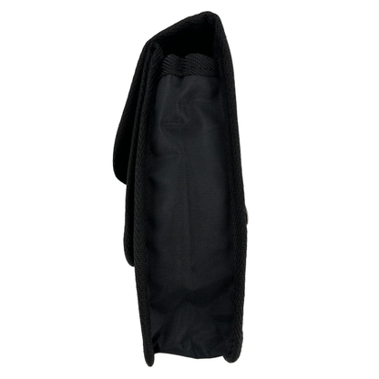 Side view of the LEO multi-compartment utility holster showing deep pockets for shears, pens, and professional instruments.