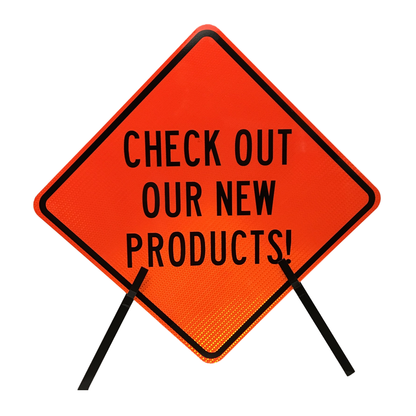 An orange diamond-shaped "Check Out Our New Products" sign mounted securely on a LEO black folding tri-pod stand.