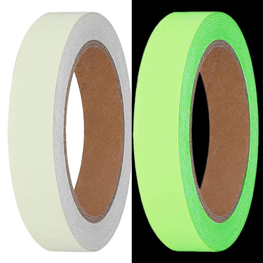Split screen comparison of a roll of PGD-6 photoluminescent tape, showing its off-white appearance in daylight on the left and its bright green luminous glow in the dark on the right.