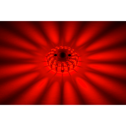 A single LEO red LED safety flare illuminated in the dark showing high-visibility 360-degree light output for traffic safety.