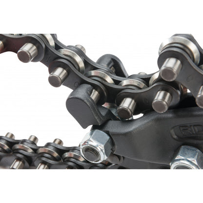 Macro shot of RIDGID soil pipe cutter chain links and cutting wheel mechanism