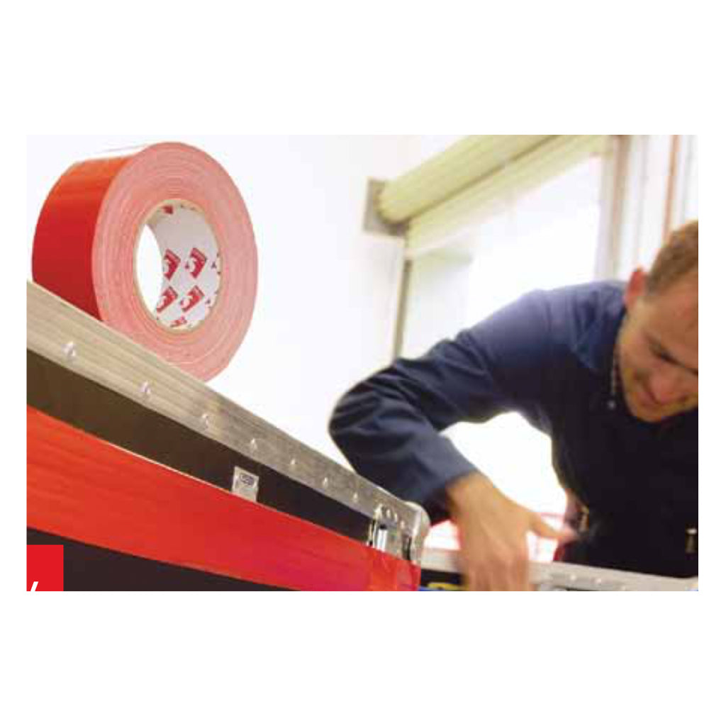 Worker Applying Scapa Red Polyethylene Serrated Tape on Industrial Surface