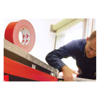 Worker Applying Scapa Red Polyethylene Serrated Tape on Industrial Surface