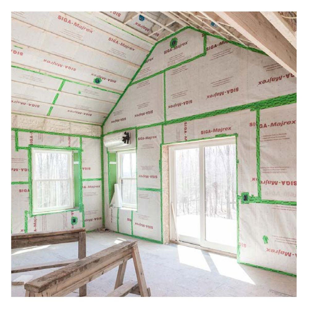 Interior view of a construction site featuring SIGA-Majrex vapor control layers fully sealed at all seams and joints with green Rissan reinforced sealing tape.