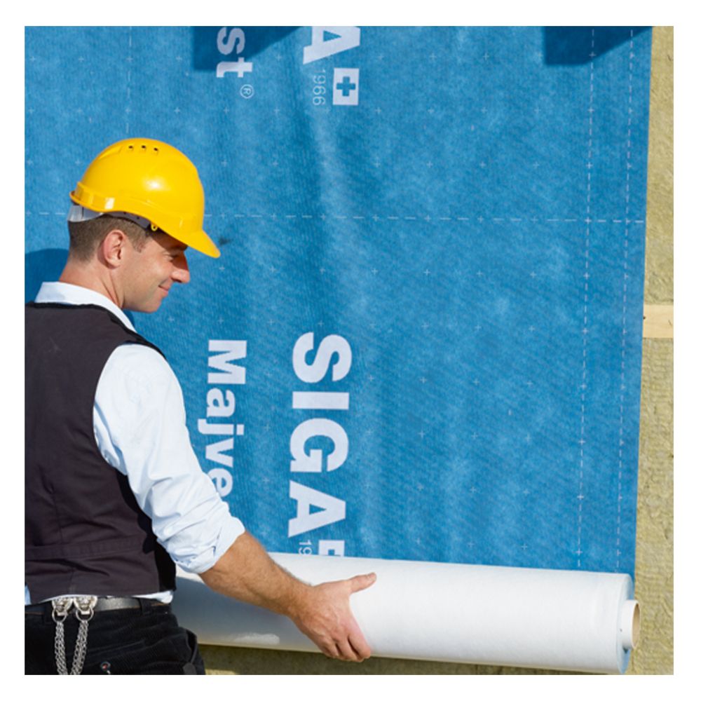 orker Installing SIGA Majvest 200 Blue Air Barrier Membrane on Building Wall