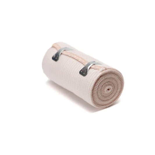 Roll of 4-inch tan elastic tensor bandage featuring two metal fastening clips for secure, adjustable compression and joint support.