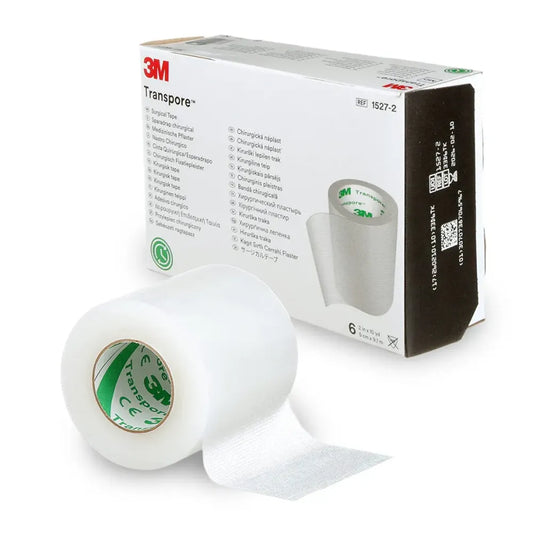 Single roll of Transpore Surgical Tape, a clear, perforated plastic medical tape designed for securing dressings and tubing with easy bi-directional tear.