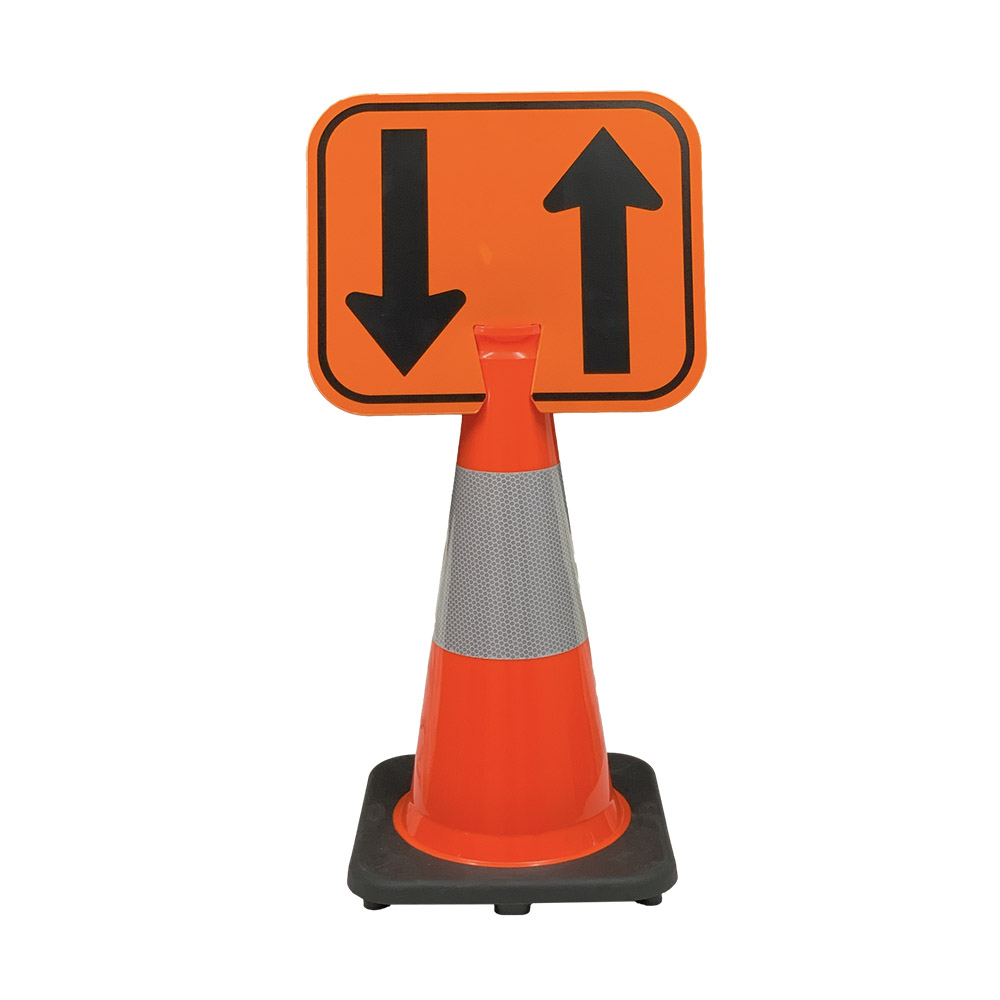 A LEO Tools two-way directional arrow sign secured to the top of a 28-inch orange traffic cone with dual reflective collars.