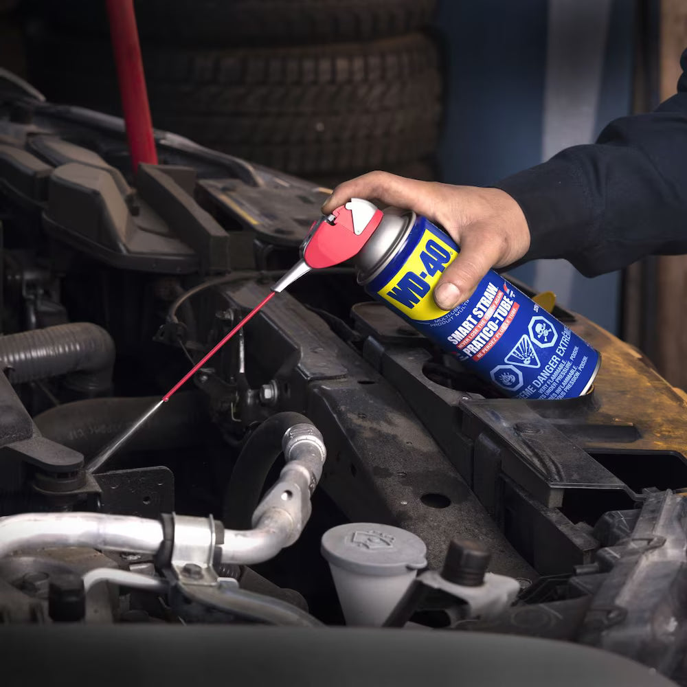 Precision application of WD-40 Multi-Use Product on a car engine component using the Smart Straw.