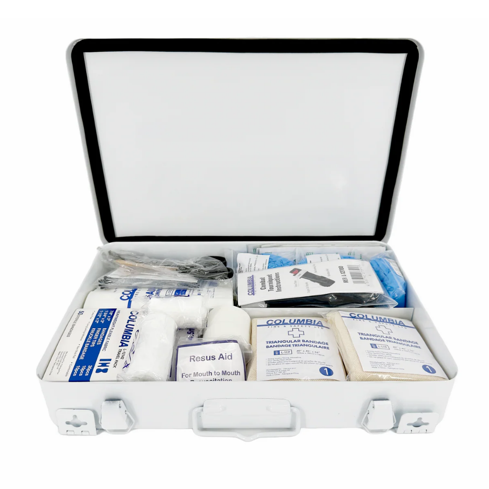 Open white metal case displaying the organized, required contents of a WorkSafeBC compliant Basic First Aid Kit, including bandages and instructions.