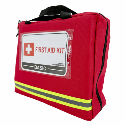Front view of the red nylon WorkSafeBC Basic First Aid Kit bag, featuring a high-visibility reflective strip and clear plastic compliance label pocket.