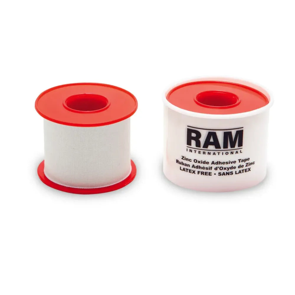 White 1-inch zinc oxide adhesive tape on a red plastic spool next to its white protective outer cover, featuring RAM International branding.
